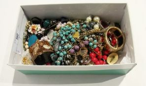 A quantity of costume jewellery, beads, brooches, etc. (1 box)