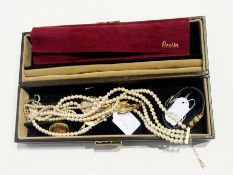 Two synthetic pearl necklaces, a cameo brooch, decorative gilt metal brooches, locket, a watch and a