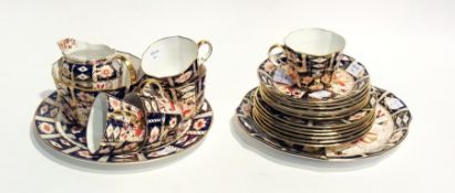 Royal Crown Derby Imari patterned part tea service viz:- five cups, six saucers, six side plates,