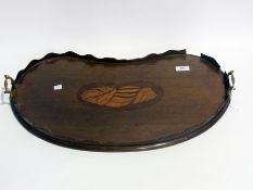Edwardian mahogany kidney-shaped two-handled tray with frilled galleried rim and inlaid central