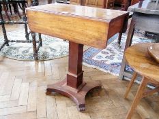 A Victorian mahogany drop-leaf occasional table on straight column support, on quatre-foil base,