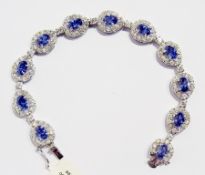 Silver, blue and white paste-stone dress bracelet, of oval clusters design