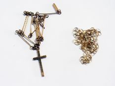 A 9ct gold fine chain necklace, 9ct gold crucifix pendant and the gold-coloured chain necklace