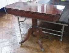 A 19th century mahogany card table, satinwood inlay, the pedestal raised on four outswept