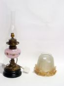 Edwardian oil lamp converted to electric, with opaque handpainted pink glass reservoir, having glass