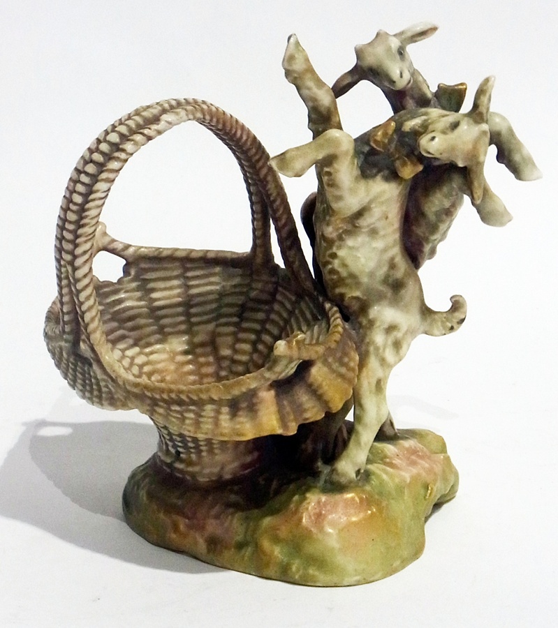 An Austrian model of goat with basket, stamped to base, No.4284, 16cm high approx.