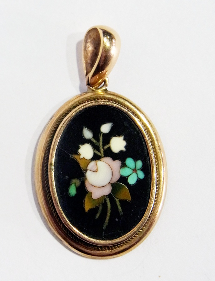 A Victorian pietra dura oval pendant set floral spray in hardstones and the gold-coloured mount