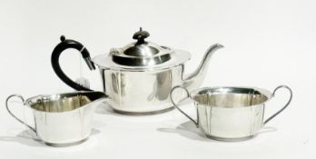 A silver plate three-piece teaset of plain oval form, comprising:- teapot, sugar basin and milk jug
