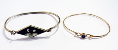 9ct gold and blue stone bangle and a silver bangle