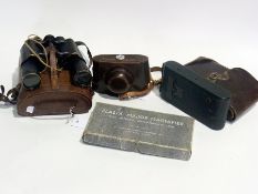 A pair of "Levista" binoculars by Aitchison, London (cased) together with a Kodak folding camera (