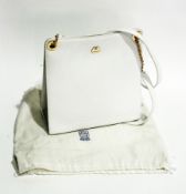 A Morabito white leather handbag with gold-coloured metal chain detail to handles, a clover to front