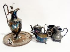Quantity of silver plate to include an urn shaped claret jug, gravy boat, mugs and tray etc.