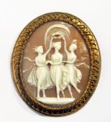 Gilt metal cameo brooch carved with the three graces, filigree applied border