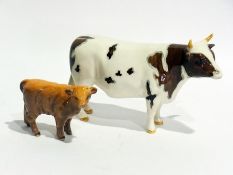 A Beswick bull and calf (2)