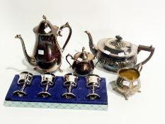 A quantity of silver plate to include:- a coffee set, coffee pot, teapot, spoons, etc.