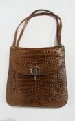 A late 20th century Harrod's leather handbag of simulated crocodile skin