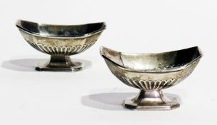 A pair of Victorian silver open salts of octagonal fluted form, on a raised foot, Birmingham 1897,