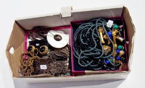 A quantity of costume jewellery to include:- beads, silver plated, etc.