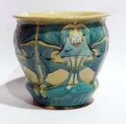 A Victorian earthenware jardiniere with tube-lined decoration in Art Nouveau style, on a turquoise