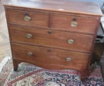A mahogany chest of two short and two long drawers, with brass handles, on bracket feet, 92cm wide