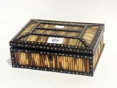 An Anglo-Indian porcupine quill and ebony box
8 x 21 cms