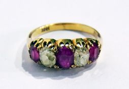 A 18ct gold ruby and diamond dress ring, set three oval rubies and two large diamonds, in claw