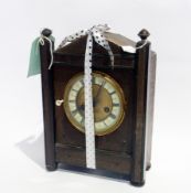 An Edwardian clock, by Ward and Son, Evesham, damaged wooden case
