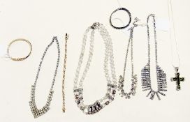 A quantity of costume jewellery to include:- diamante necklace, cross on chain, diamante bracelet,