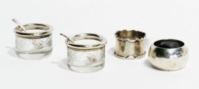 An early 20th century silver napkin ring, of plain form, inscribed "John", Birmingham 1908, another,