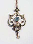 Edwardian 9ct gold aquamarine-coloured stone and seed pearl scroll pendant with drop, on fine chain