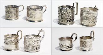 Warsaw white metal silver plate tea glass holders, some by Fraget and Norbling (8)