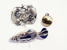 Scottish silver brooch pierced with scrolling fish, marked "CAI", silver buttonhole brooch for