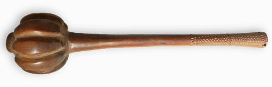 A native club, possibly Pacific Islands, with melon-shaped head, 38cm long and the blade of