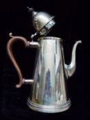 A silver coffee pot with domed cover, 25cm high, London 1968, 27oz gross