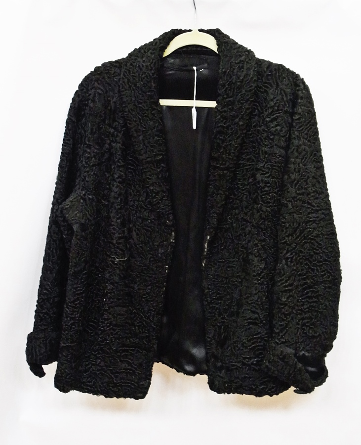 A vintage short lamb fur jacket