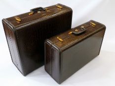 Two 1950s Samsonite cases, in faux crocodile skin , one 46cm high and the other 35cm high (2)