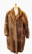 A vintage fur coat, possibly musquash