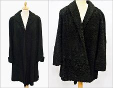 A Mongolian black lamb jacket and another long black lamb jacket (2)