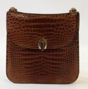 A late 20th century Harrods leather handbag simulated as crocodile skin