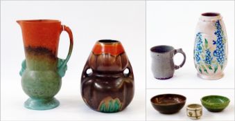 Four Winchcombe studio pottery items, comprising two bowls, a cup and an egg cup and three studio