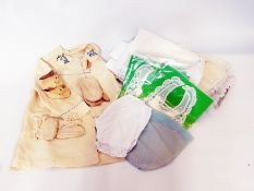 Baby gowns, bibs, shoes etc (1 box)
