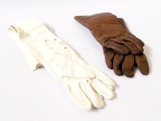 A quantity of assorted gloves to include:- leather, suede, a pair of white suede gloves with