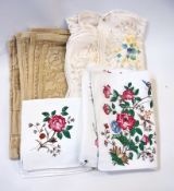 A quantity of table linen to include:- small napkins, lace tablecloths, etc.