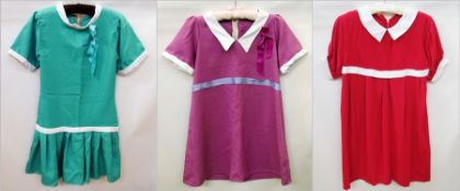 Three girl's "Annie" dresses, one red, one purple and one green (3)