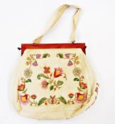 Embroidered handbag, with cream ground, floral decoration, with bakelite clasp