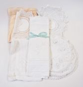 A box of table linen, napkins, doilies, etc. (1 box)