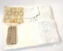 A quantity of table linen to include:- white lace table cloth, napkins, other items (1 box)