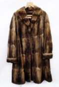 A HM Donaldson long musquash coat