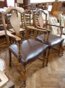 Pair Shoolbred carvers 20th century open armchairs, having shaped arched top rail, vase-shaped