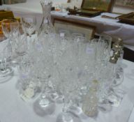 Large quantity cut glass tableware to include:- champagne flutes, goblets, stemmed wines etc